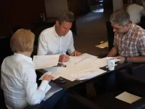 project managers discussing initiation tasks